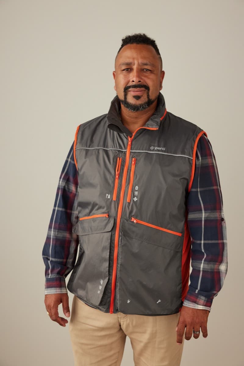 A man wearing the Perci Vest over everyday clothes